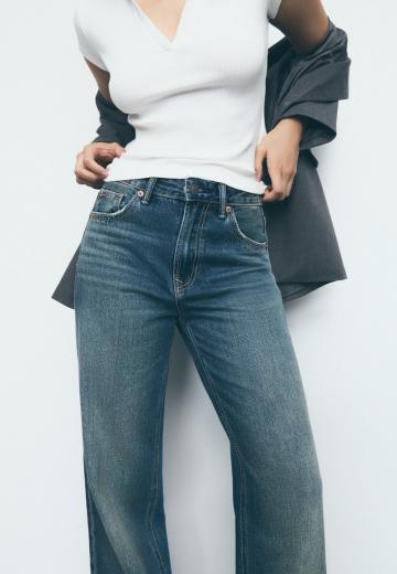 Клешеные джинсы