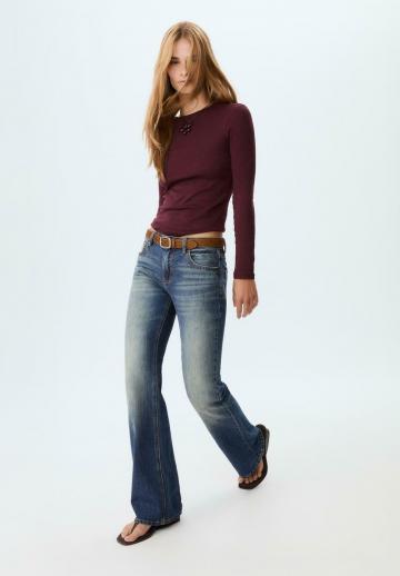 Клешеные джинсы