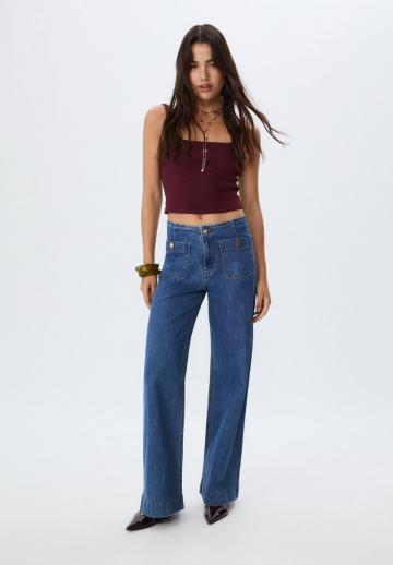 Клешеные джинсы