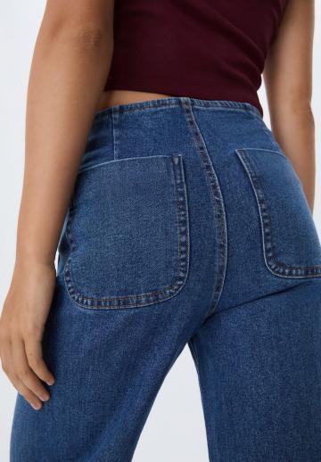 Клешеные джинсы