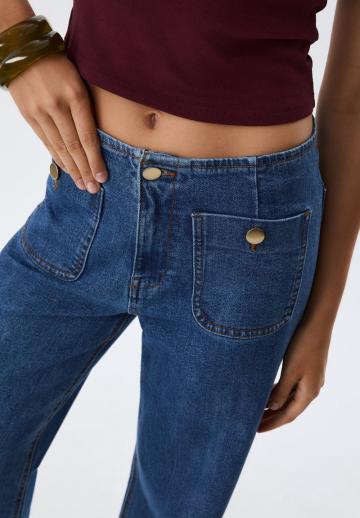 Клешеные джинсы
