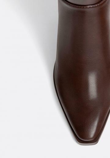 Высокие сапоги