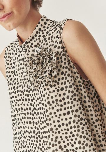 Блузка без рукавов