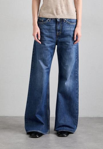Клешеные джинсы