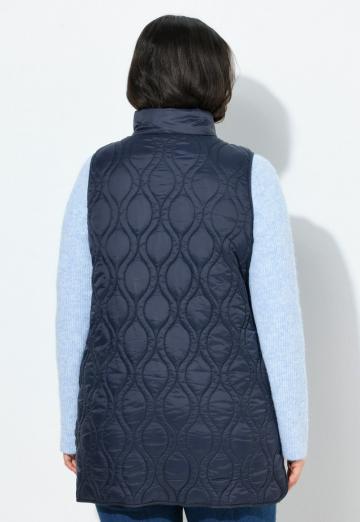 Длинный жилет