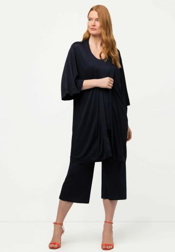 Длинный жилет