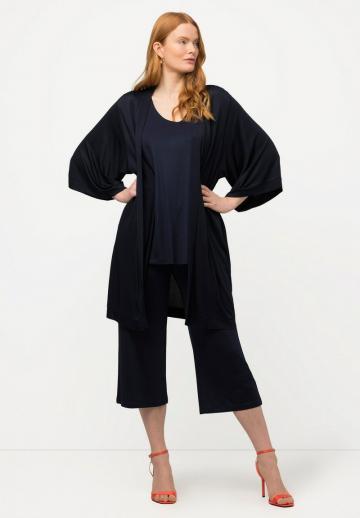 Длинный жилет