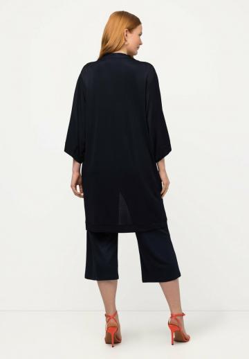 Длинный жилет