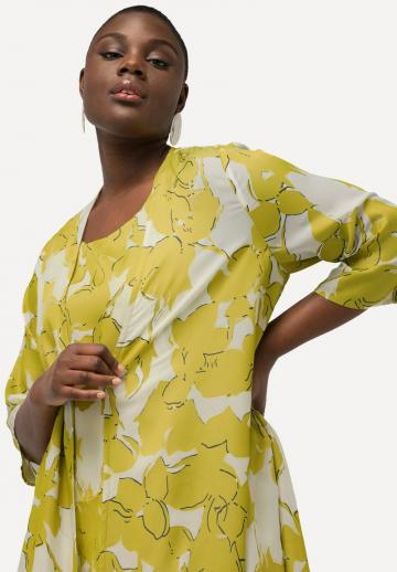 Длинный жилет