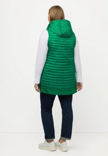 Длинный жилет