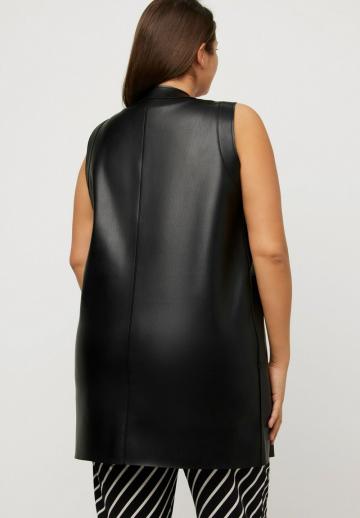 Длинный жилет