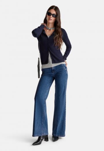 Клешеные джинсы