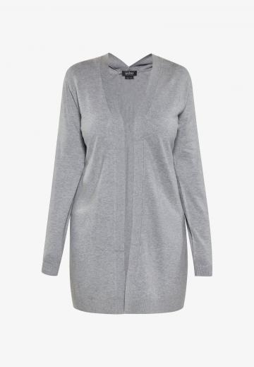 Длинный жилет