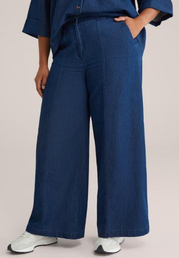 Клешеные джинсы