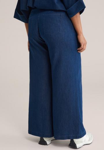 Клешеные джинсы