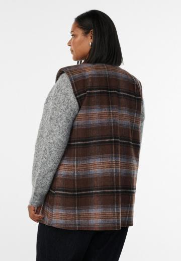 Длинный жилет