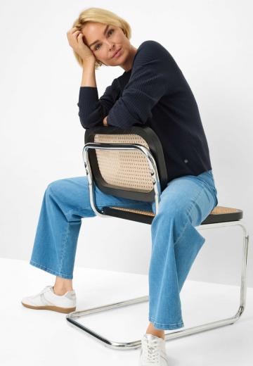 Клешеные джинсы