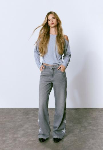 Клешеные джинсы