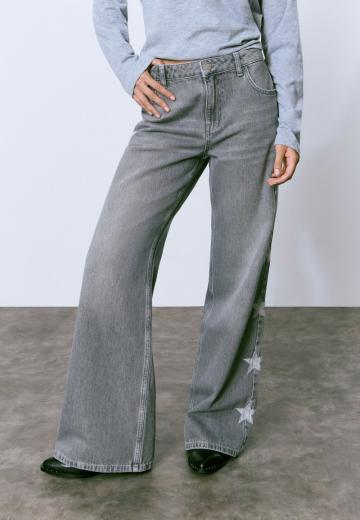 Клешеные джинсы