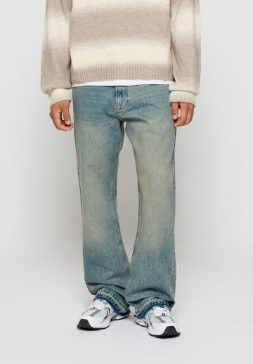 Клешеные джинсы