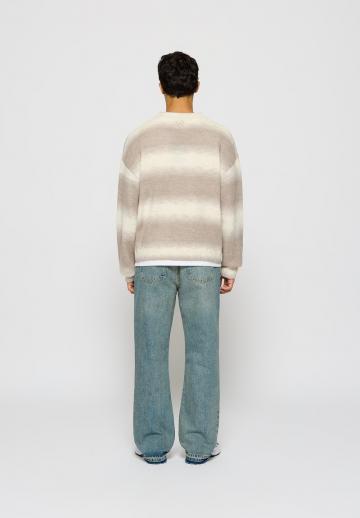 Клешеные джинсы