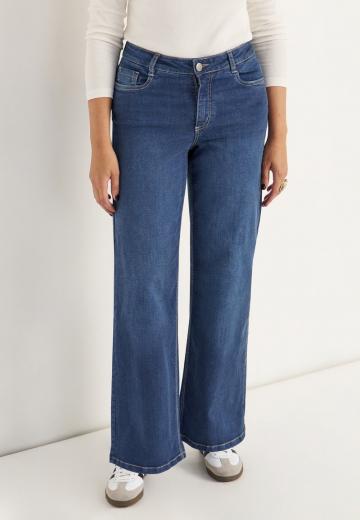 Клешеные джинсы