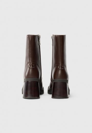 Высокие сапоги