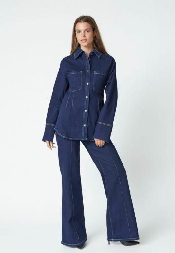 Клешеные джинсы