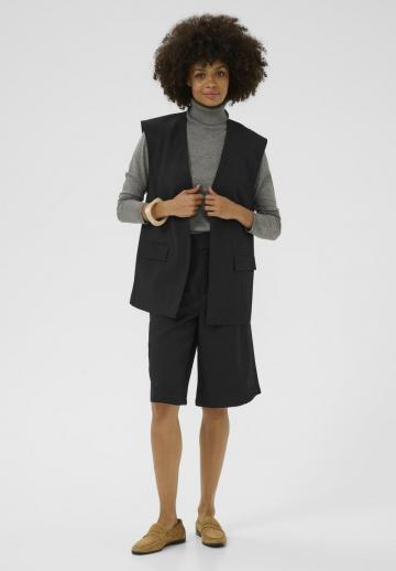 Длинный жилет