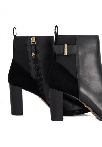 Высокие сапоги