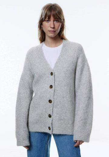 Длинный жилет