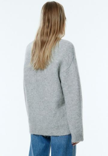 Длинный жилет