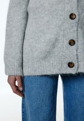 Длинный жилет