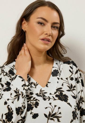 Длинная блузка