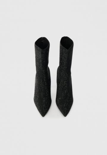 Высокие сапоги