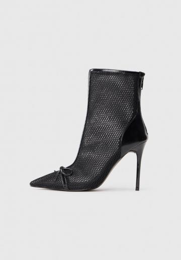 Высокие сапоги