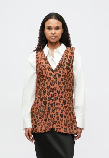 Длинный жилет