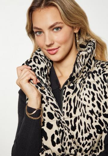 Длинный жилет