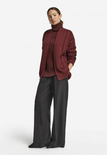 Длинный жилет