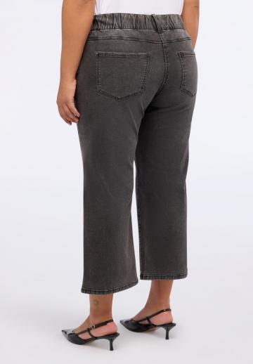 Клешеные джинсы
