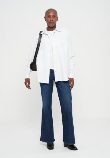 Клешеные джинсы