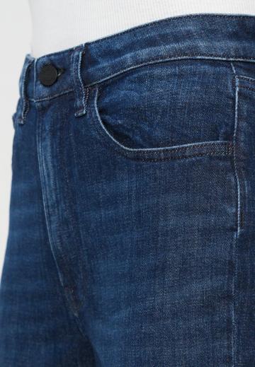 Клешеные джинсы