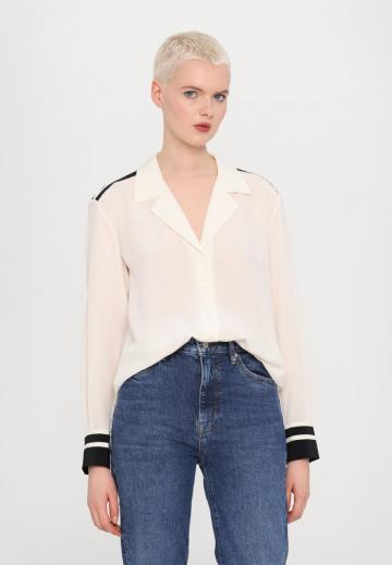 Клешеные джинсы