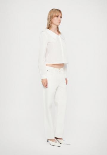 Клешеные джинсы