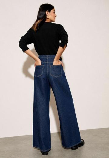 Клешеные джинсы
