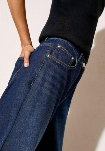 Клешеные джинсы