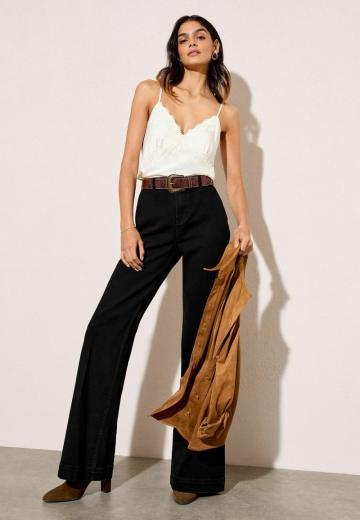 Клешеные джинсы