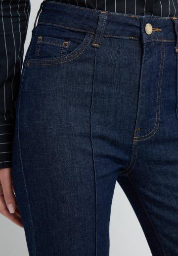 Клешеные джинсы