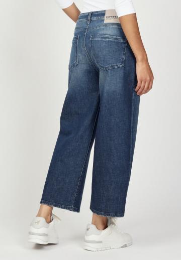Клешеные джинсы