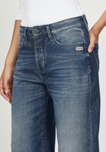 Клешеные джинсы